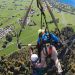 Hang glider clinging for life