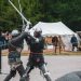 2 men sword fighting