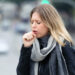 young woman coughing